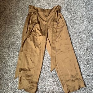 Universal Standard yellow paper bag tie pants.